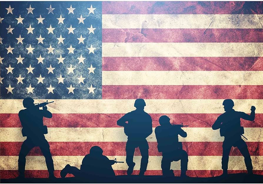 US flag with solders in the foreground